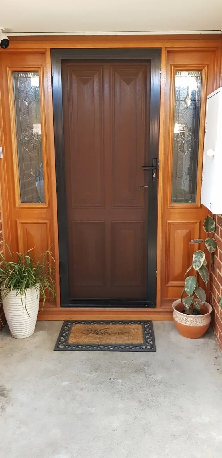 Black security door entrance installation by SupaScreens.