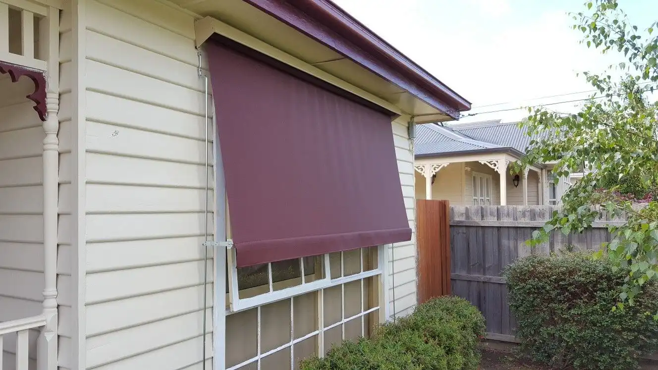 Black wrought iron security door installation by SupaScreens.