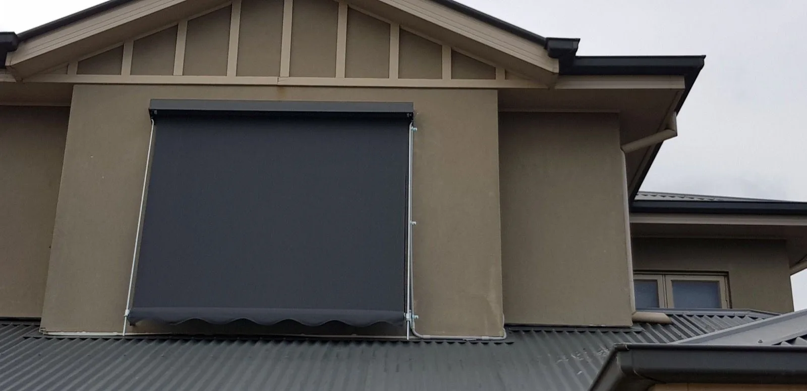 Outdoor blind weatherboard gable installation by SupaScreens.
