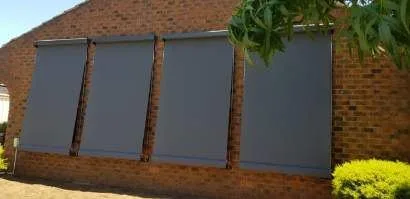 Outdoor blinds four windows installation by SupaScreens.