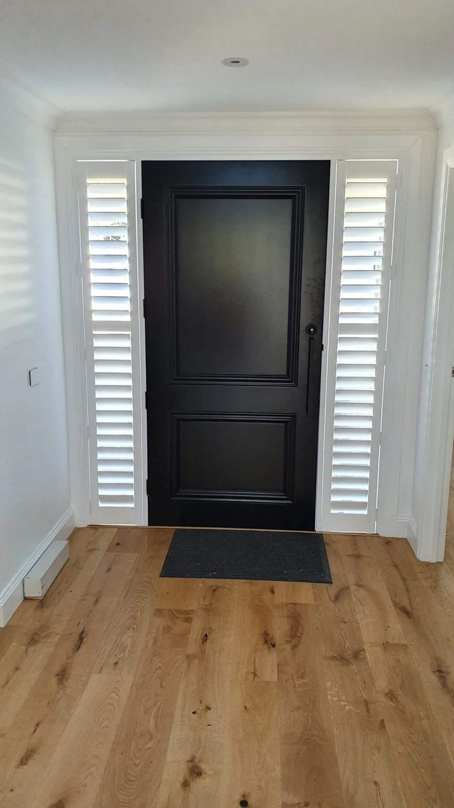 Plantation shutter sidelights door installation by SupaScreens.