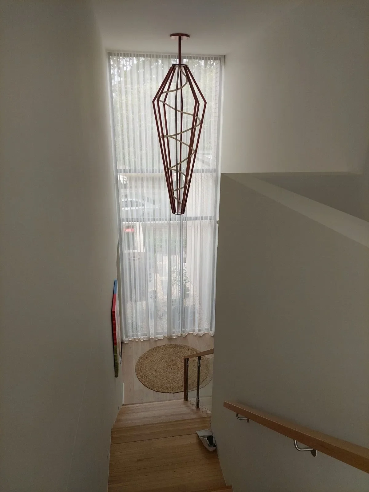 Sheer curtains living space window installation by SupaScreens.