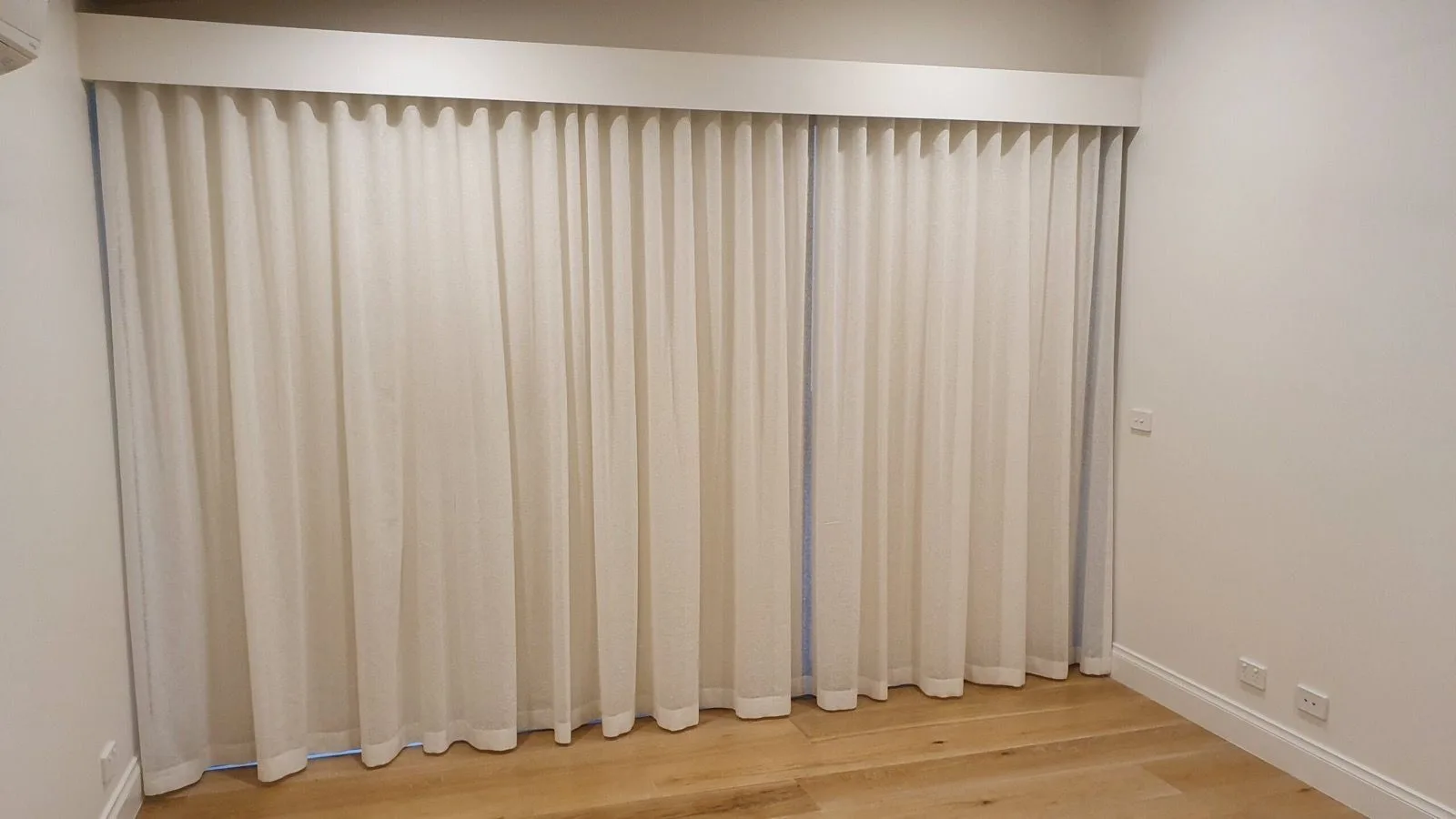 Sheer curtains sliding door space installation by SupaScreens.